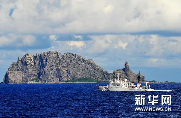 （新华网）（4）中国海监船舶编队14日抵达钓鱼岛海域开展维权巡航执法