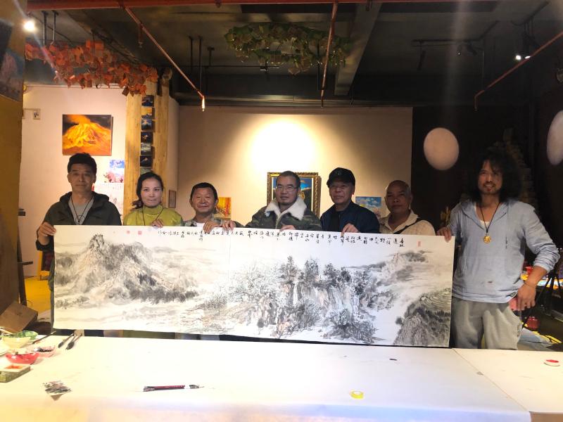 迪庆、广州两地画家以书画献礼祖国70华诞